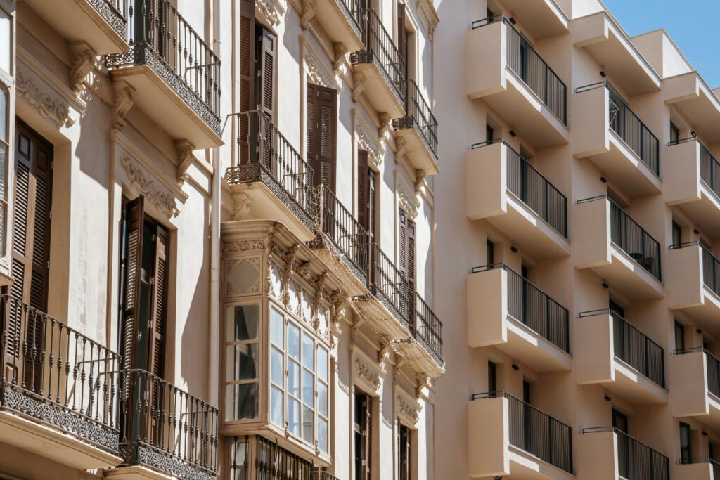 Discover the juxtaposition of classic and modern architecture in sunny Málaga, Spain.